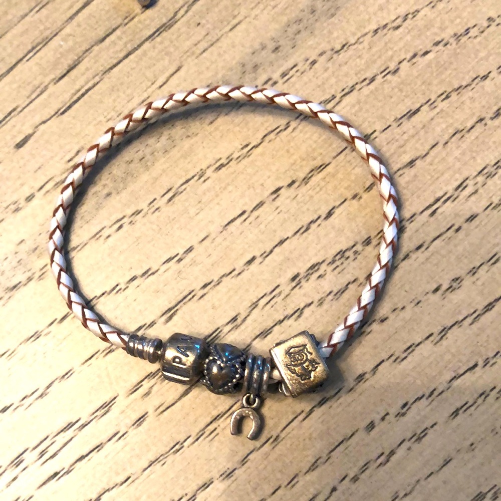 Pandora woven charm bracelet with charms
